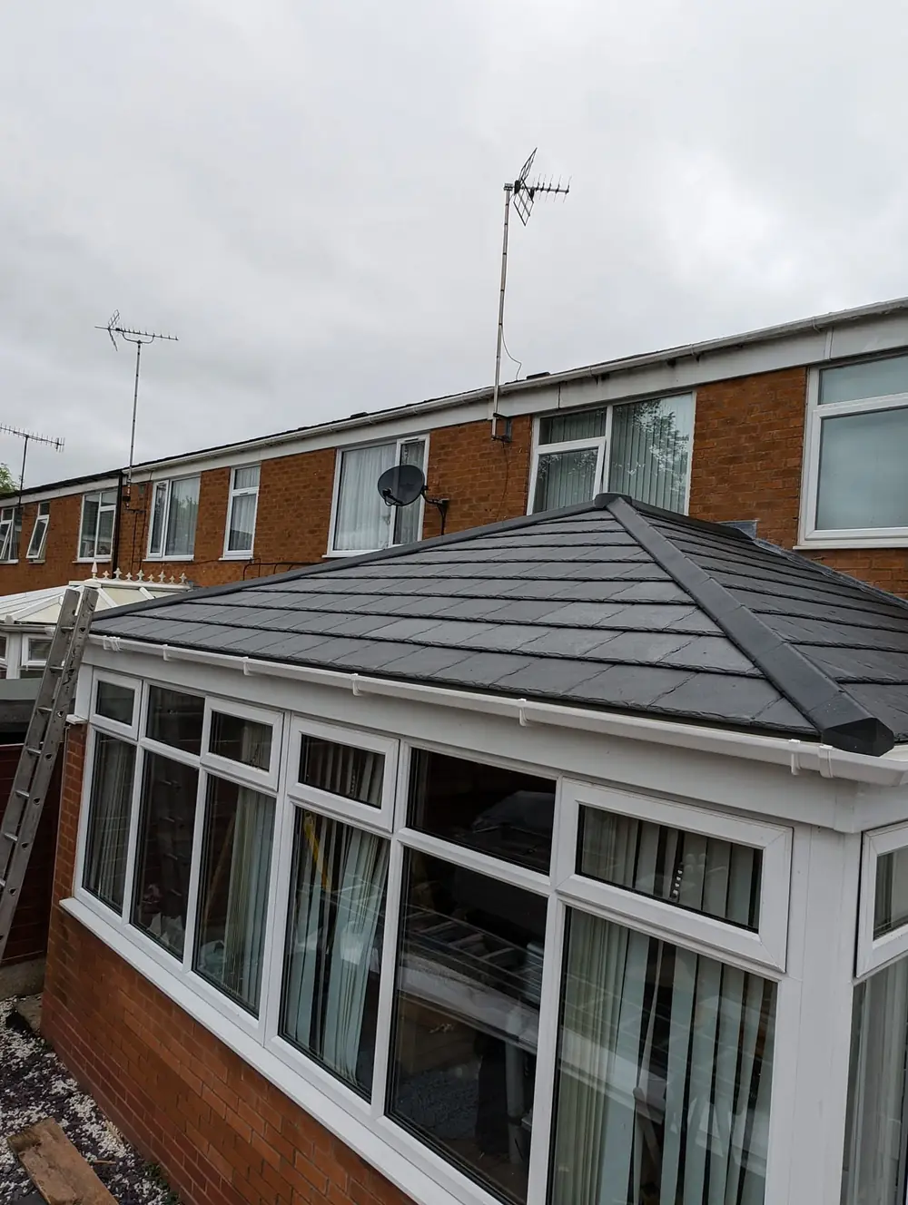 Conservatory fitted with a new insulated tiled roof