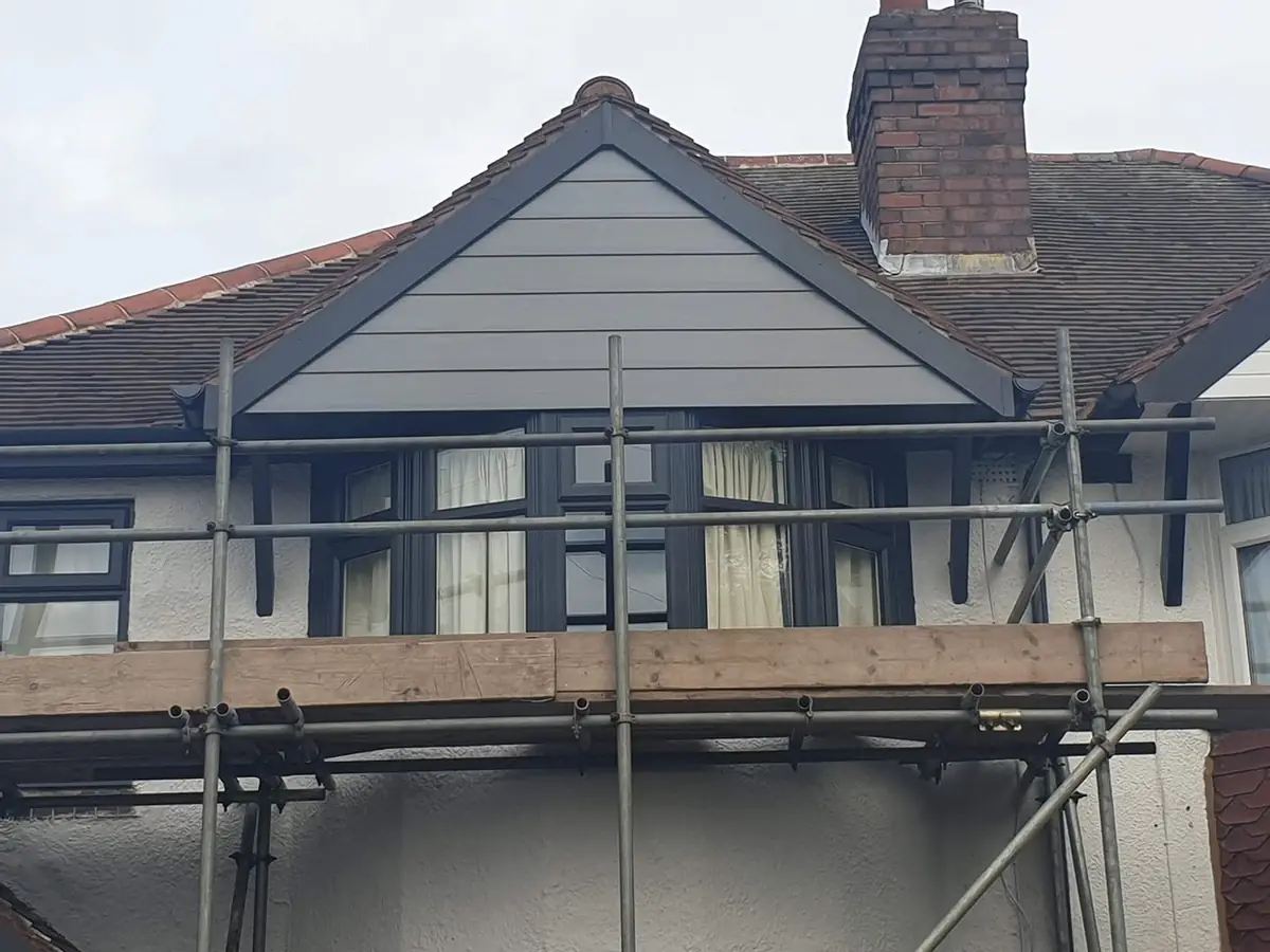 New anthracite grey gable cladding and fascias