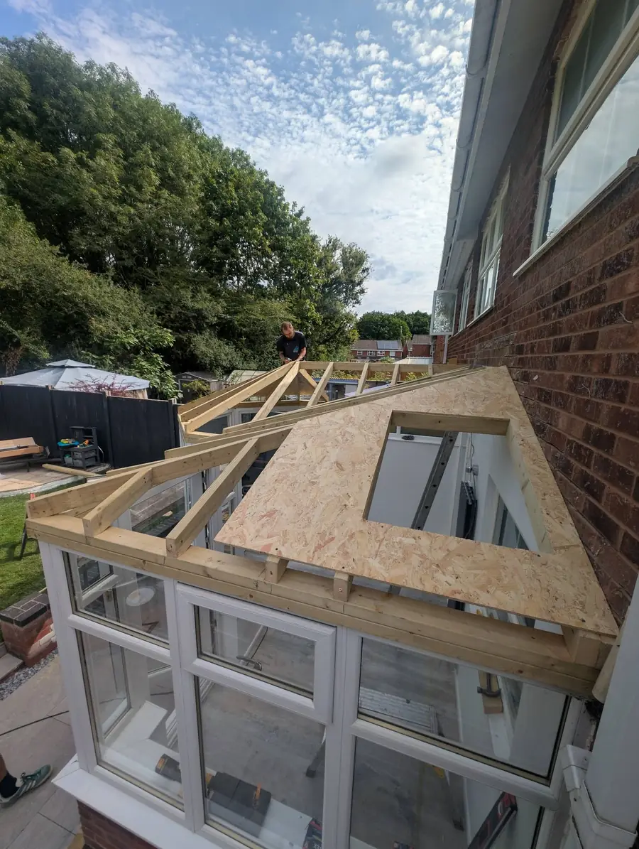 Fitting new timber roof trusses over a conservatory