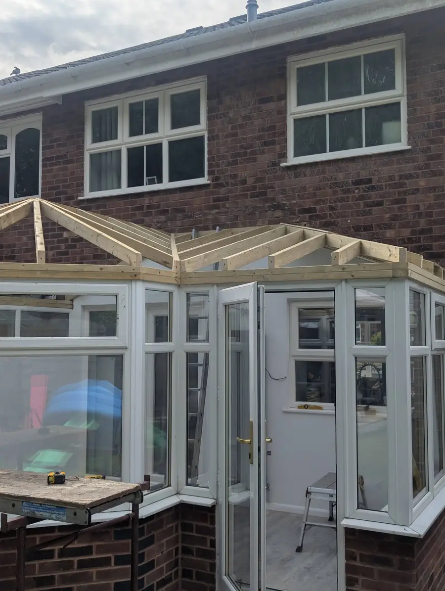 New timber roof frame built over an existing conservatory