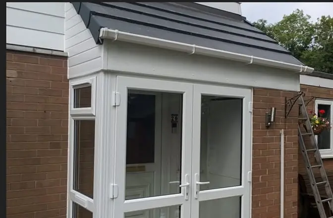 New porch with white frames and tiled roof